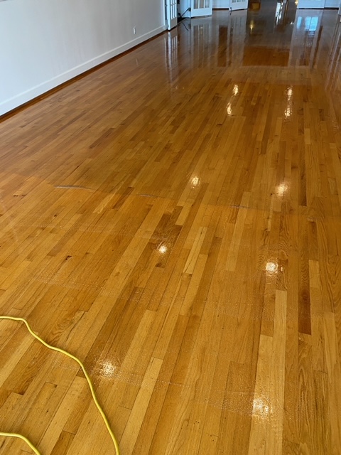 WOOD FLOOR CLEANING AT THE PELICAN YACHT CLUB